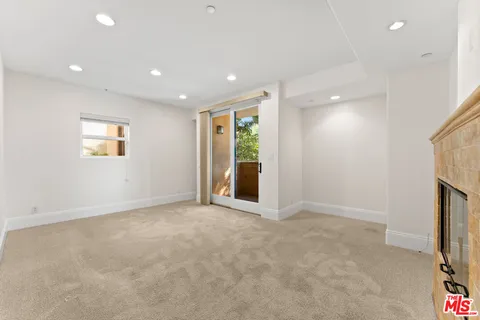 a bathroom with a shower and a sink