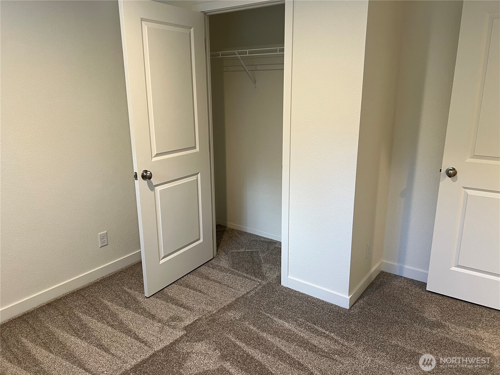512 Southwest Berry Lake Road, Unit 21 Port Orchard, WA 98367 - Photo 14 of 19 an empty room with closet