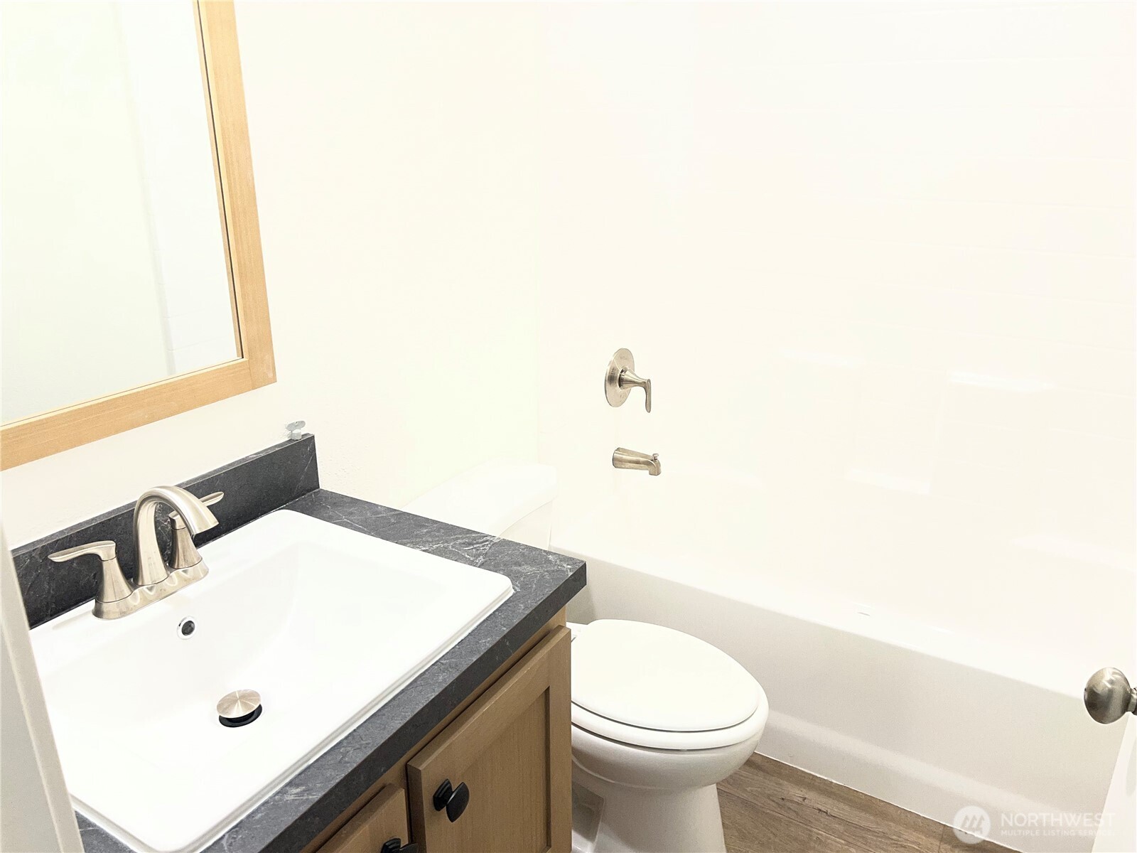 512 Southwest Berry Lake Road, Unit 21 Port Orchard, WA 98367 - Photo 17 of 19 a bathroom with a sink and a toilet