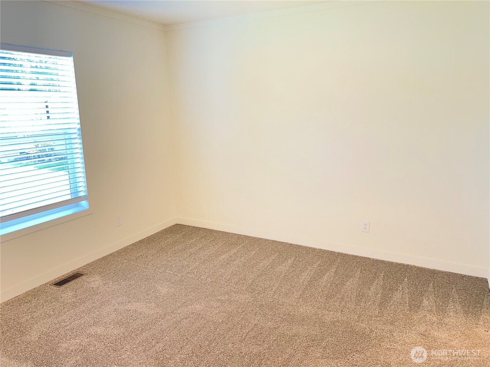 512 Southwest Berry Lake Road, Unit 21 Port Orchard, WA 98367 - Photo 10 of 19 an empty room with a window