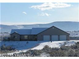 830 Hideaway Road Yakima, WA 98908 - Photo 1 of 13 a view of a house with a yard