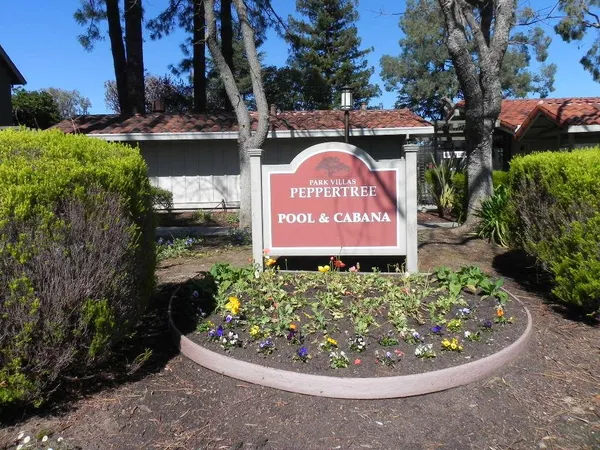 a view of a sign on the side of the road