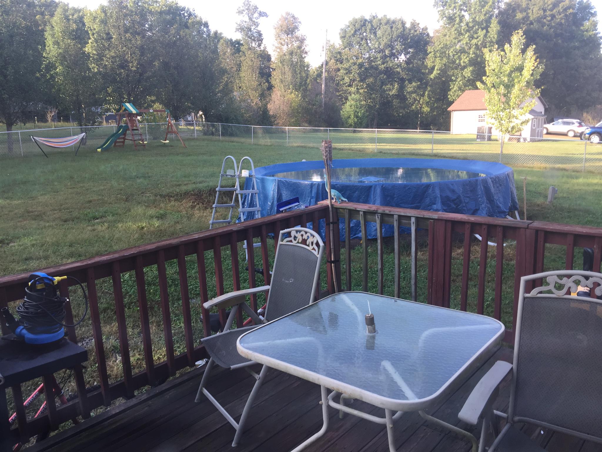 1079 Coker Ford Road Portland, TN 37148 - Photo 22 of 24 a balcony with table and chairs