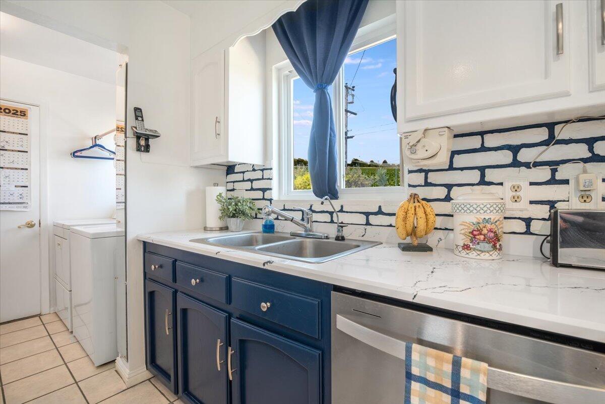 412 Milky Way Lompoc, CA 93436 - Photo 11 of 40 a kitchen with sink and a window