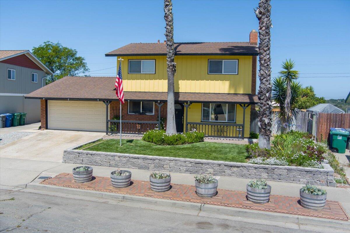 412 Milky Way Lompoc, CA 93436 - Photo 2 of 40 a front view of a house with garden