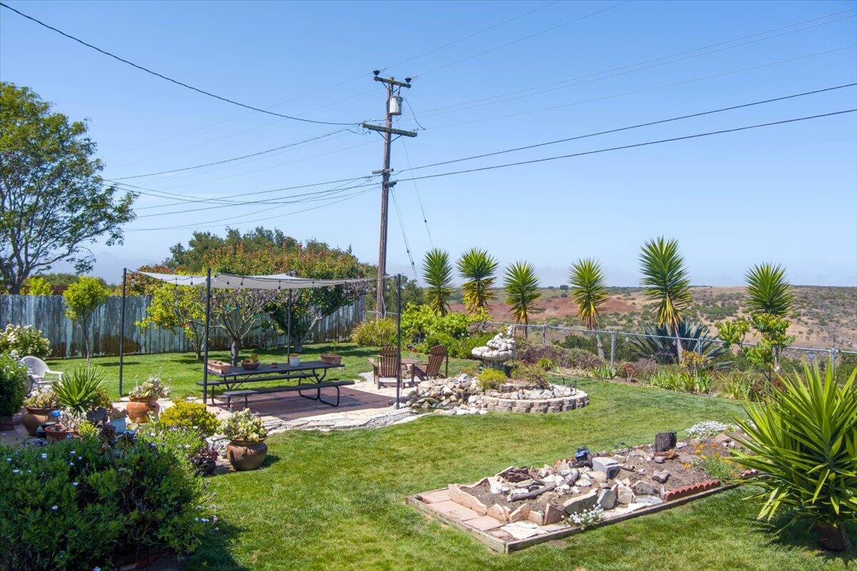 412 Milky Way Lompoc, CA 93436 - Photo 22 of 40 a view of a garden with plants