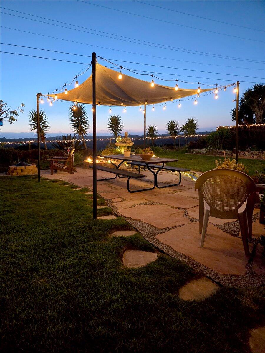 412 Milky Way Lompoc, CA 93436 - Photo 27 of 40 a swimming pool with outdoor seating and yard