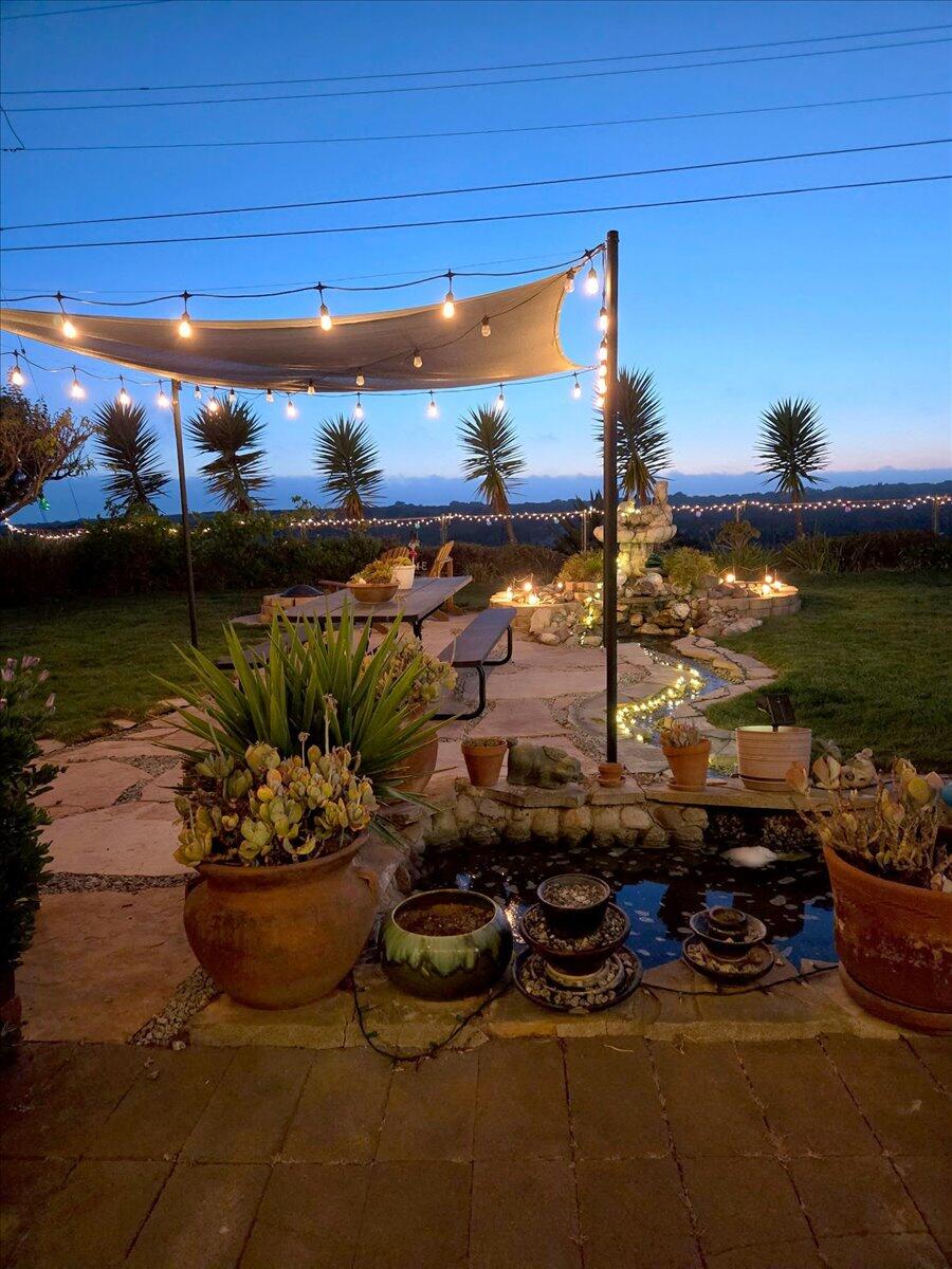 412 Milky Way Lompoc, CA 93436 - Photo 29 of 40 a view of a terrace with dining table and chairs