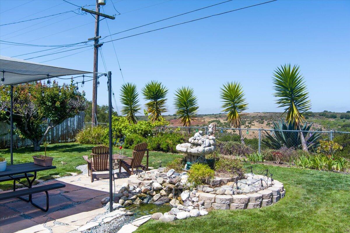 412 Milky Way Lompoc, CA 93436 - Photo 30 of 40 a garden view with a seating space