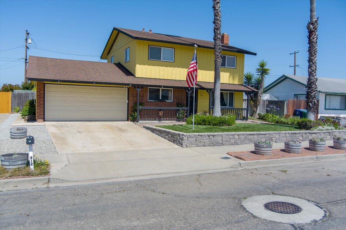412 Milky Way Lompoc, CA 93436 - Photo 3 of 40 a front view of house along with street