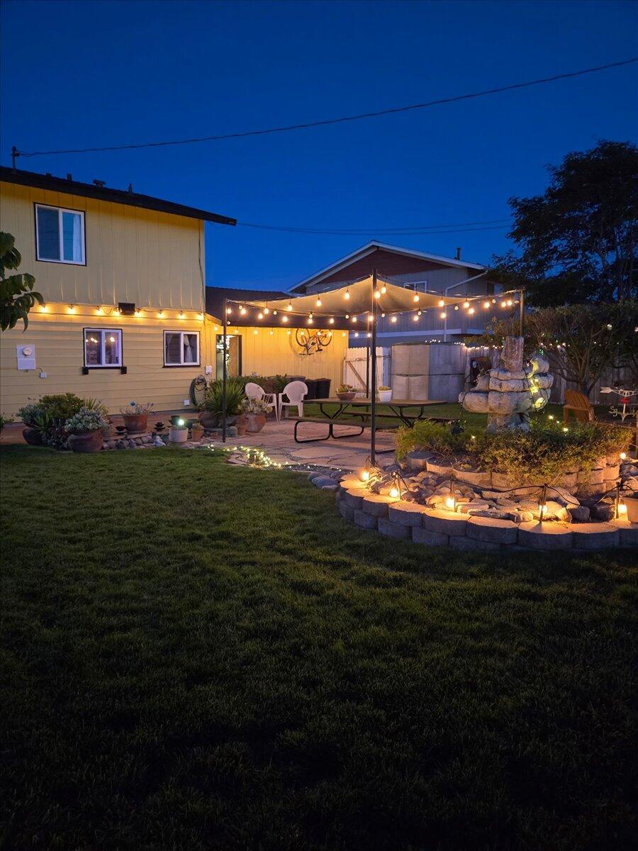 412 Milky Way Lompoc, CA 93436 - Photo 34 of 40 a view of a house with a yard porch and sitting area