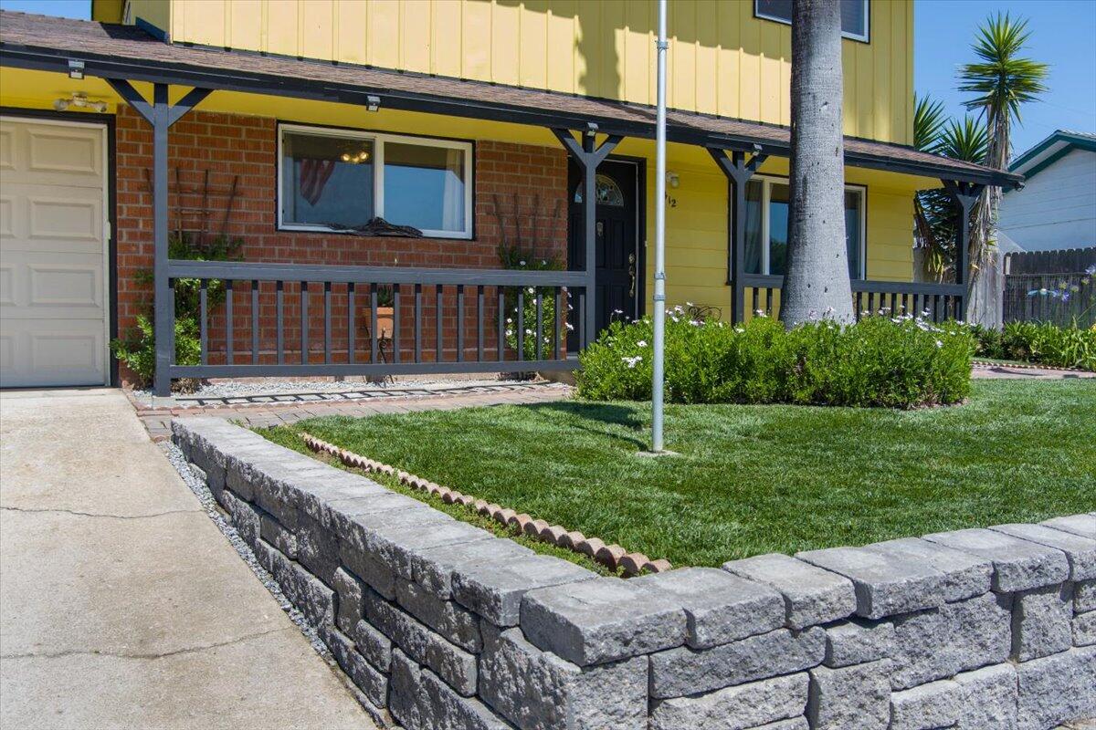 412 Milky Way Lompoc, CA 93436 - Photo 4 of 40 a view of a house with a yard and pathway