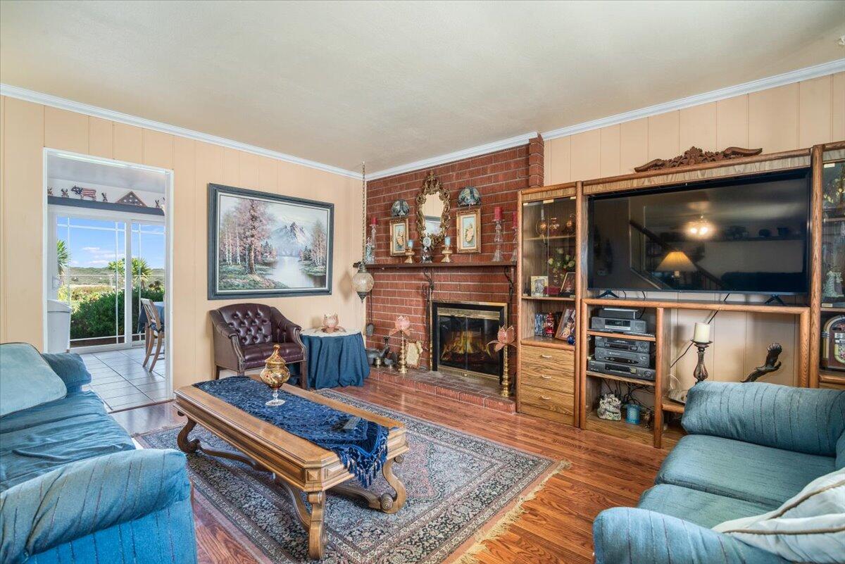 412 Milky Way Lompoc, CA 93436 - Photo 5 of 40 a living room with furniture and a flat screen tv