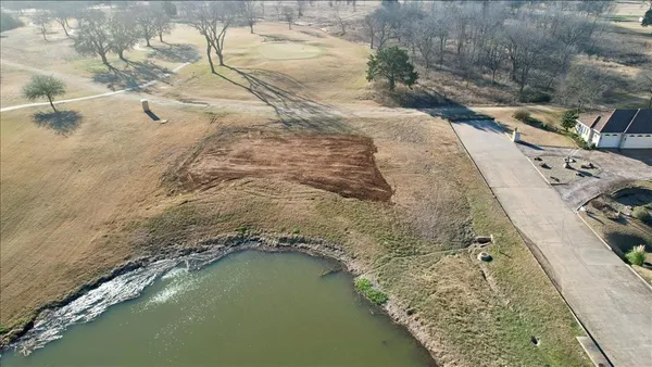 a bath tub sitting in middle of a river