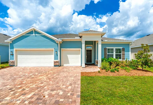 a house view with a garden space