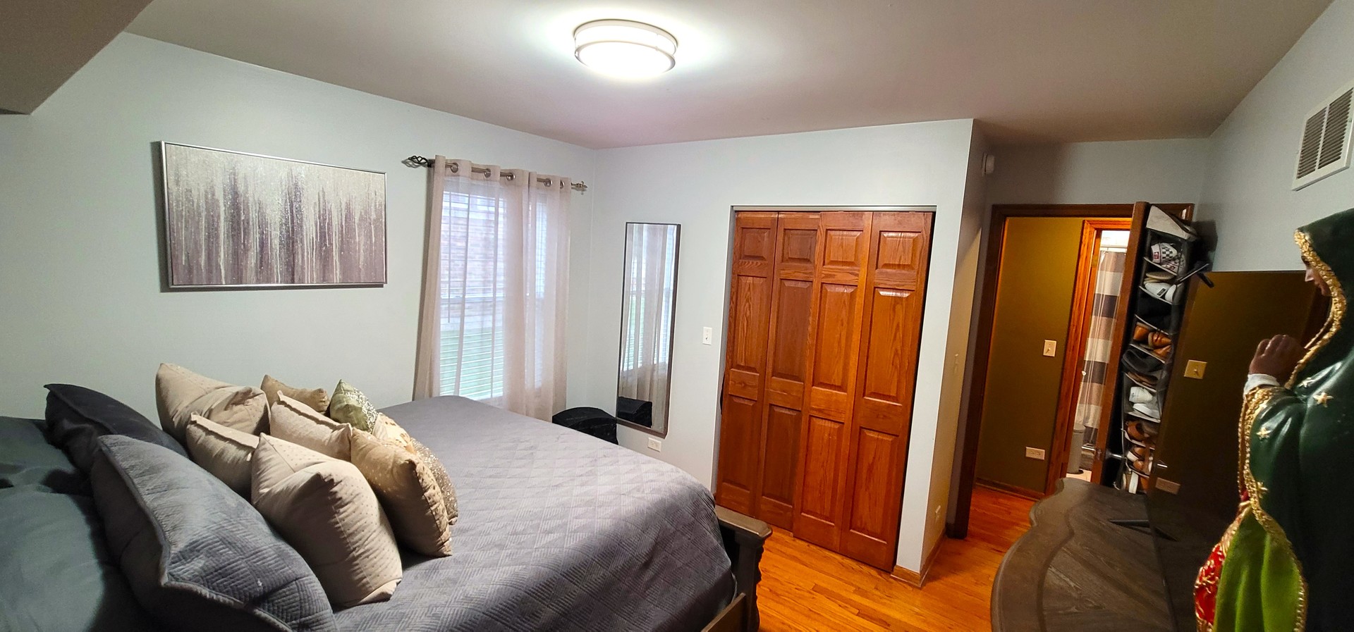 1817 Maple Road Homewood, IL 60430 - Photo 12 of 42 a bedroom with a bed and a closet