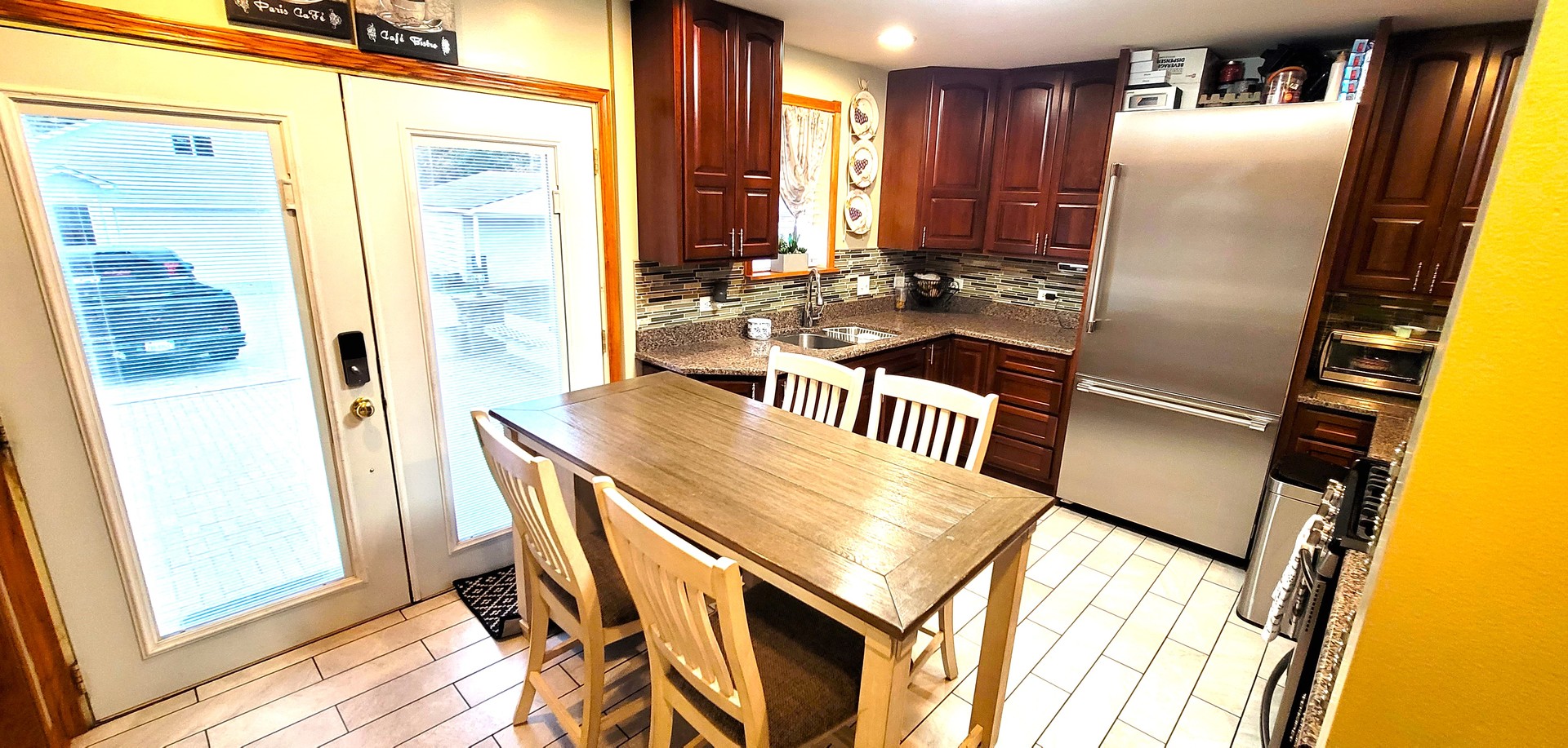 1817 Maple Road Homewood, IL 60430 - Photo 8 of 42 a view of kitchen with furniture and refrigerator