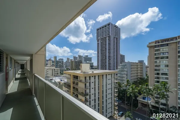 a view of a balcony with city view