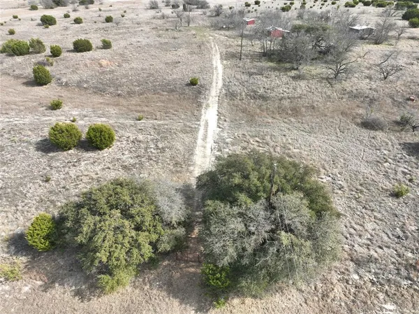 a view of a wooden door of a yard