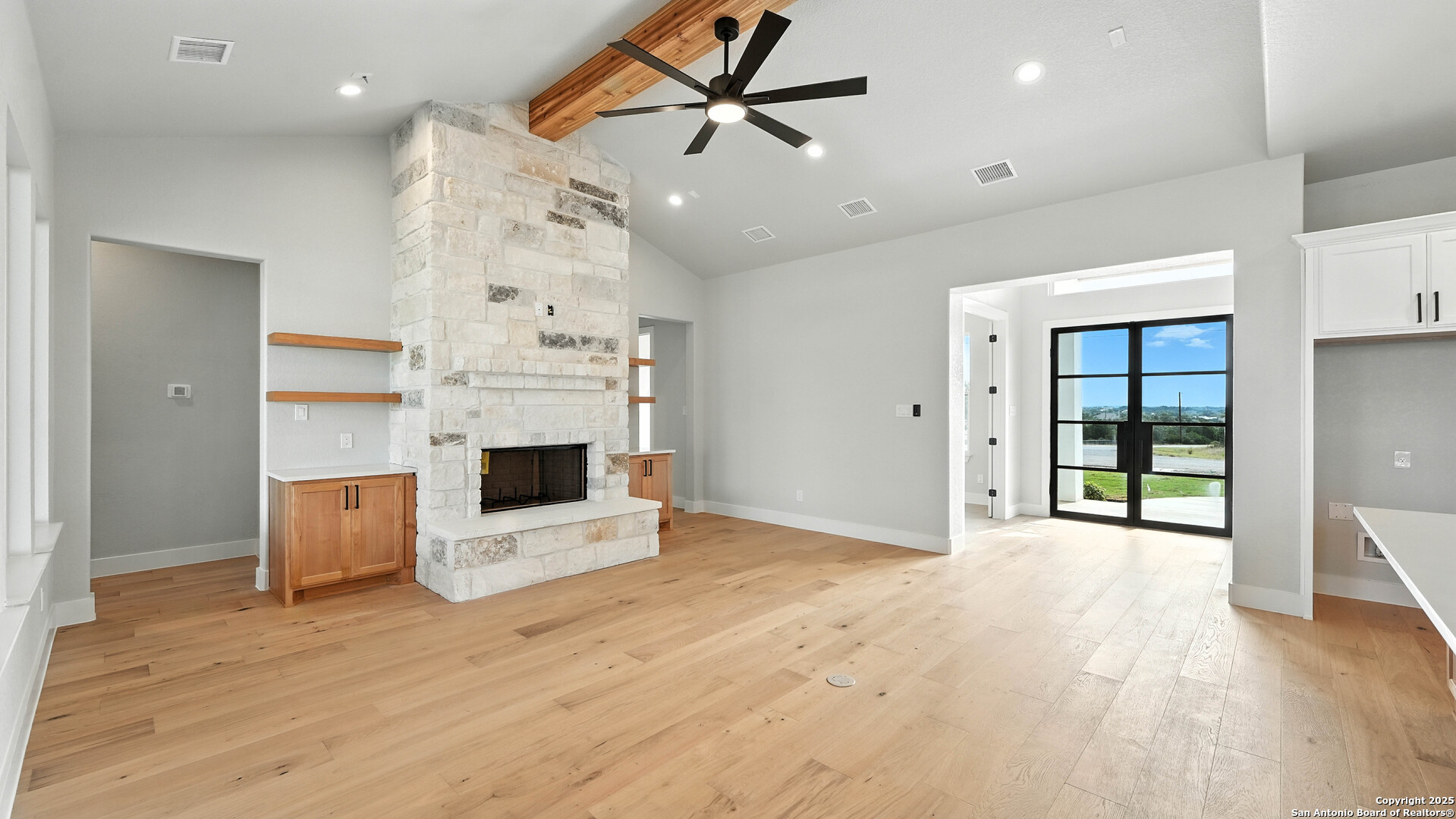 306 Toucan Drive Spring Branch, TX 78070 - Photo 15 of 50 an empty room with windows and fireplace