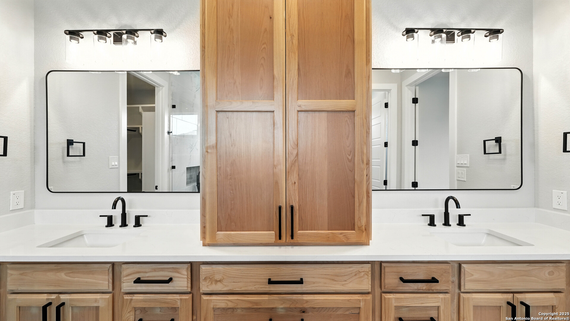 306 Toucan Drive Spring Branch, TX 78070 - Photo 38 of 50 a bathroom with double vanity sink and mirror