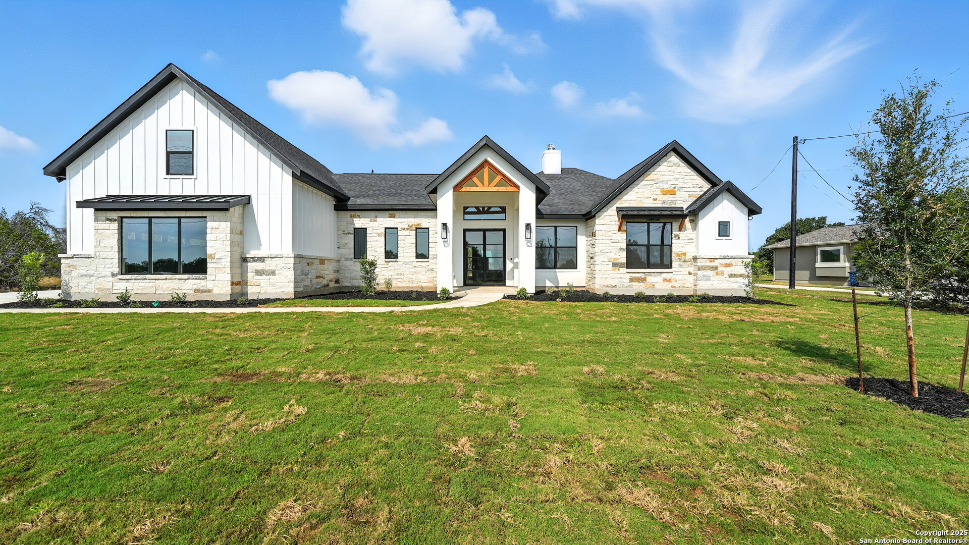 306 Toucan Drive Spring Branch, TX 78070 - Photo 4 of 50 a front view of house with yard and green space