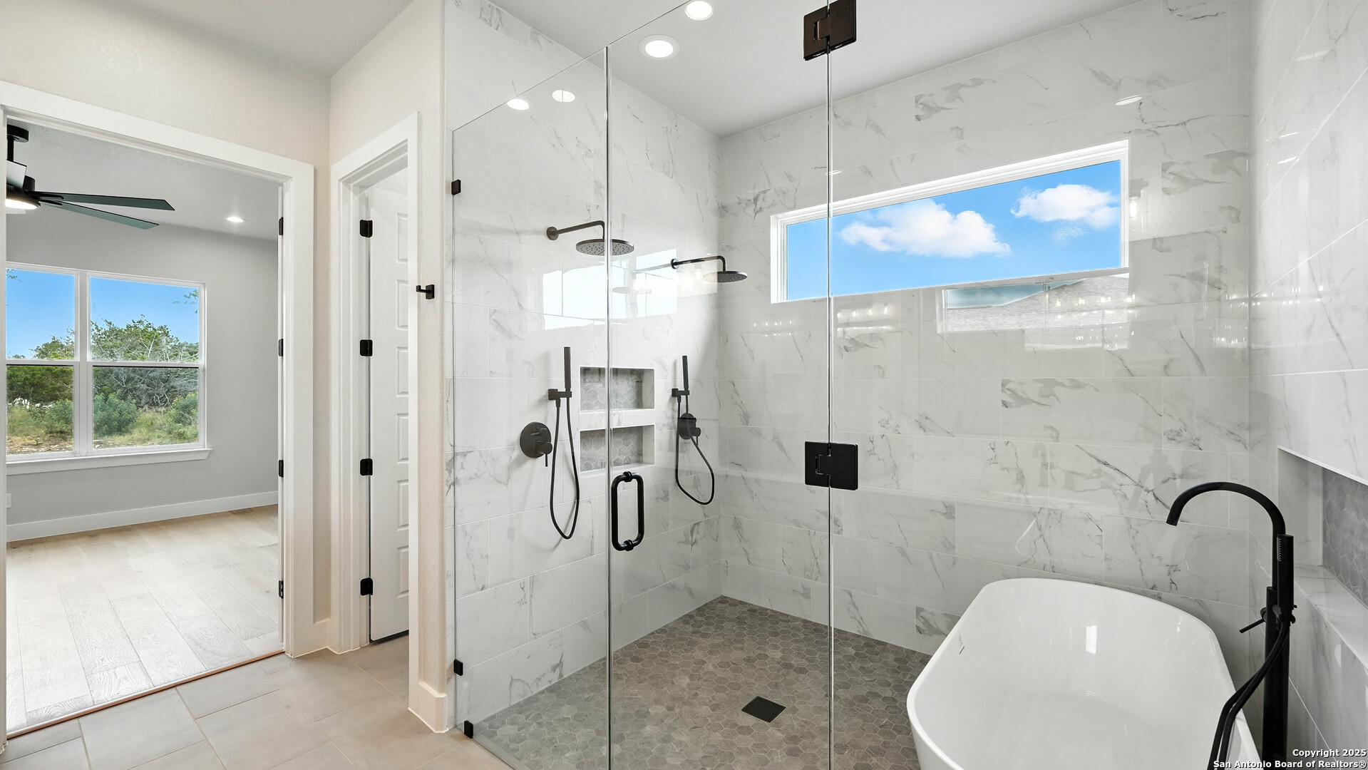 306 Toucan Drive Spring Branch, TX 78070 - Photo 41 of 50 a bathroom with a sink and shower