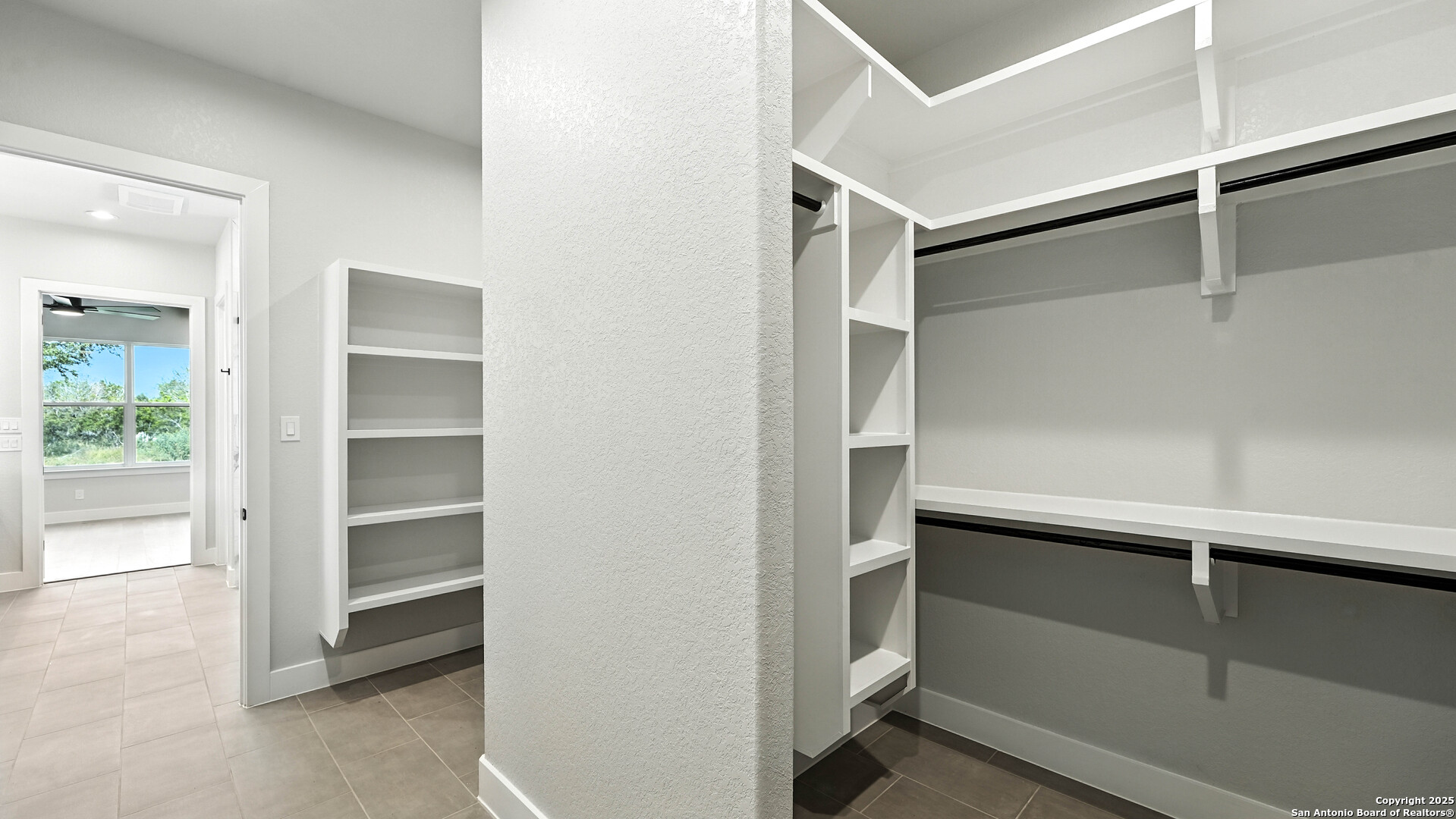 306 Toucan Drive Spring Branch, TX 78070 - Photo 42 of 50 a view of walk in closet with empty racks