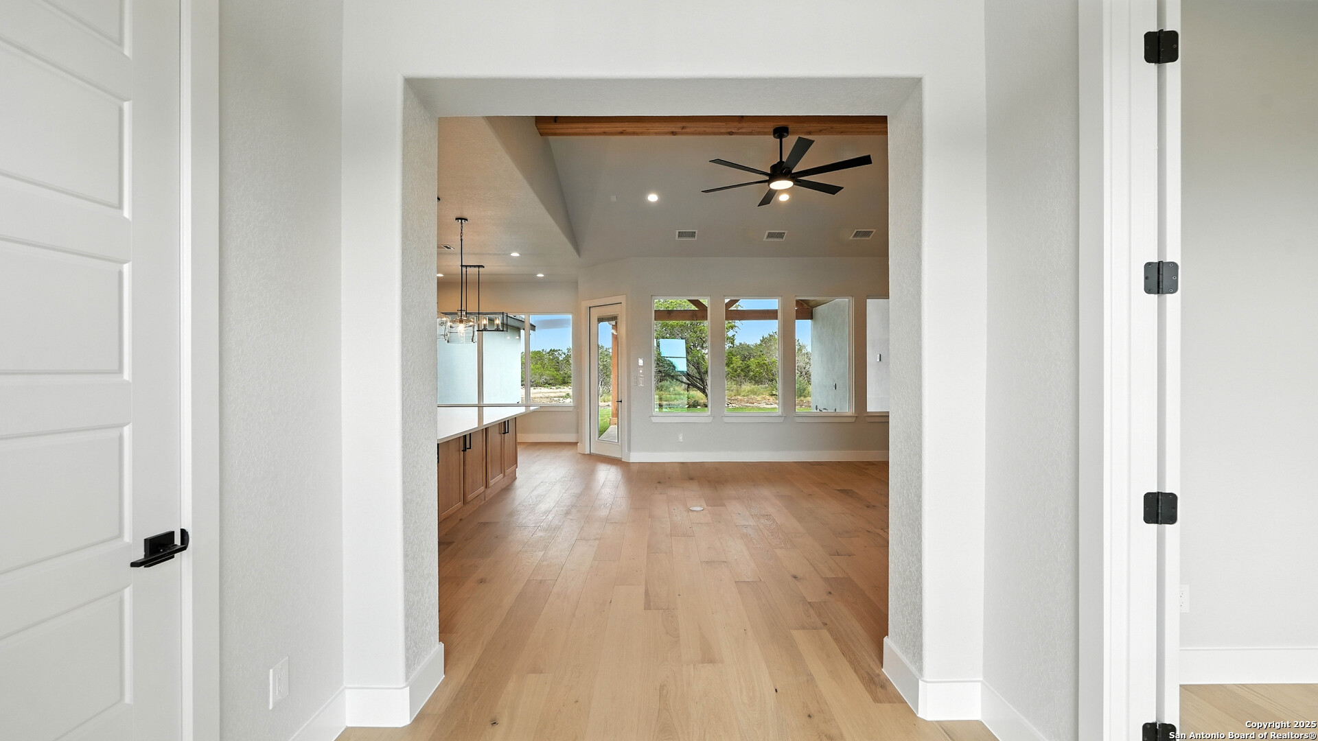 306 Toucan Drive Spring Branch, TX 78070 - Photo 6 of 50 a view of a hallway view with wooden floor and front door