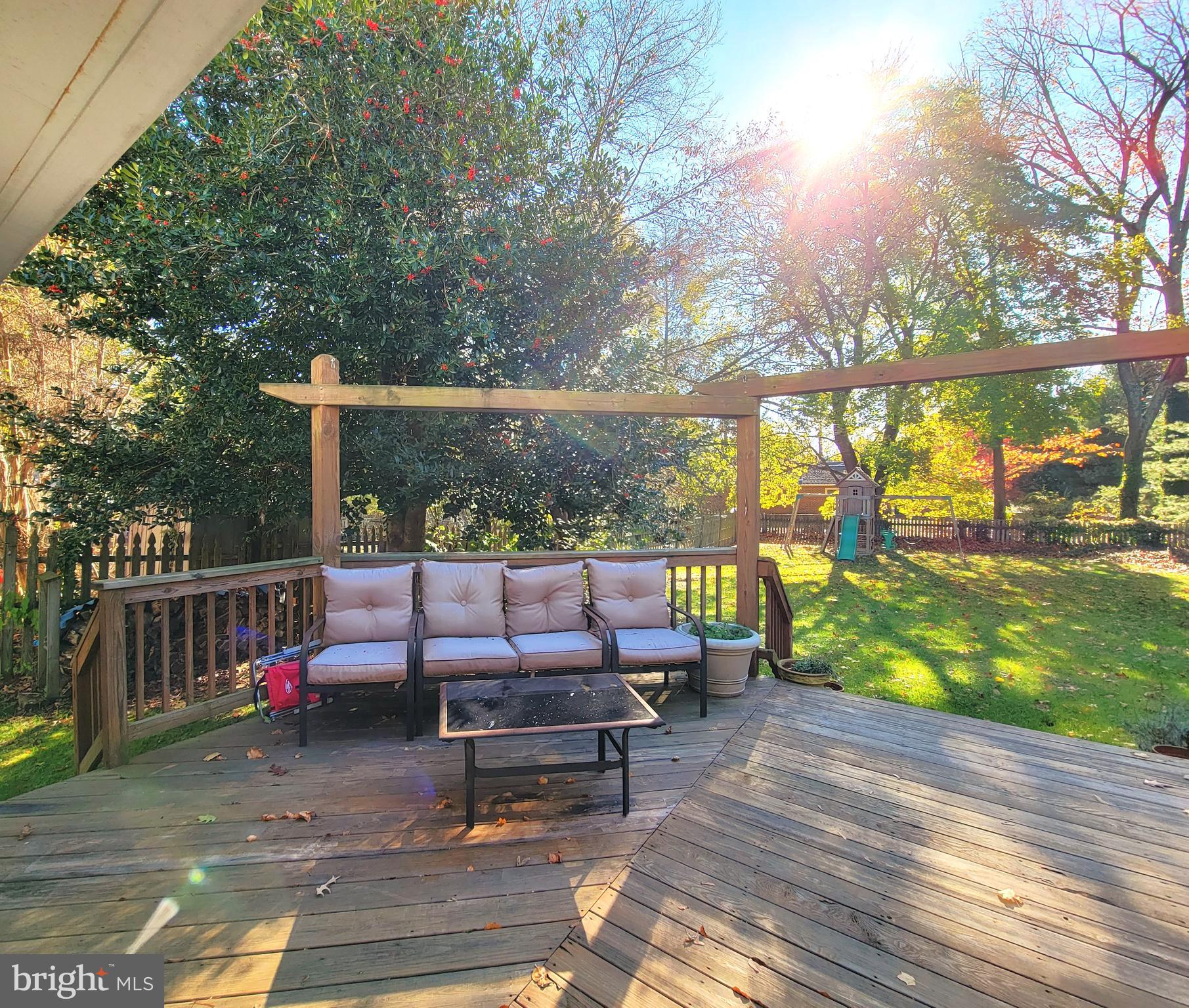 214 Villanova Road Glassboro, NJ 08028 - Photo 11 of 15 a bench sitting on top of a wooden floor
