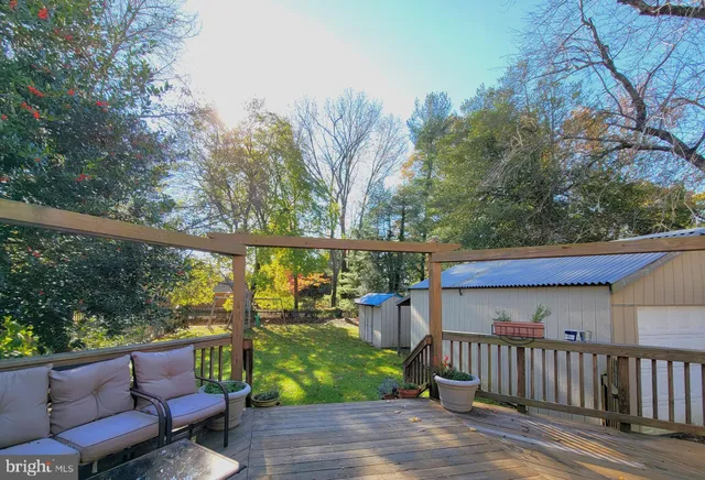 a view of a two chairs in the deck