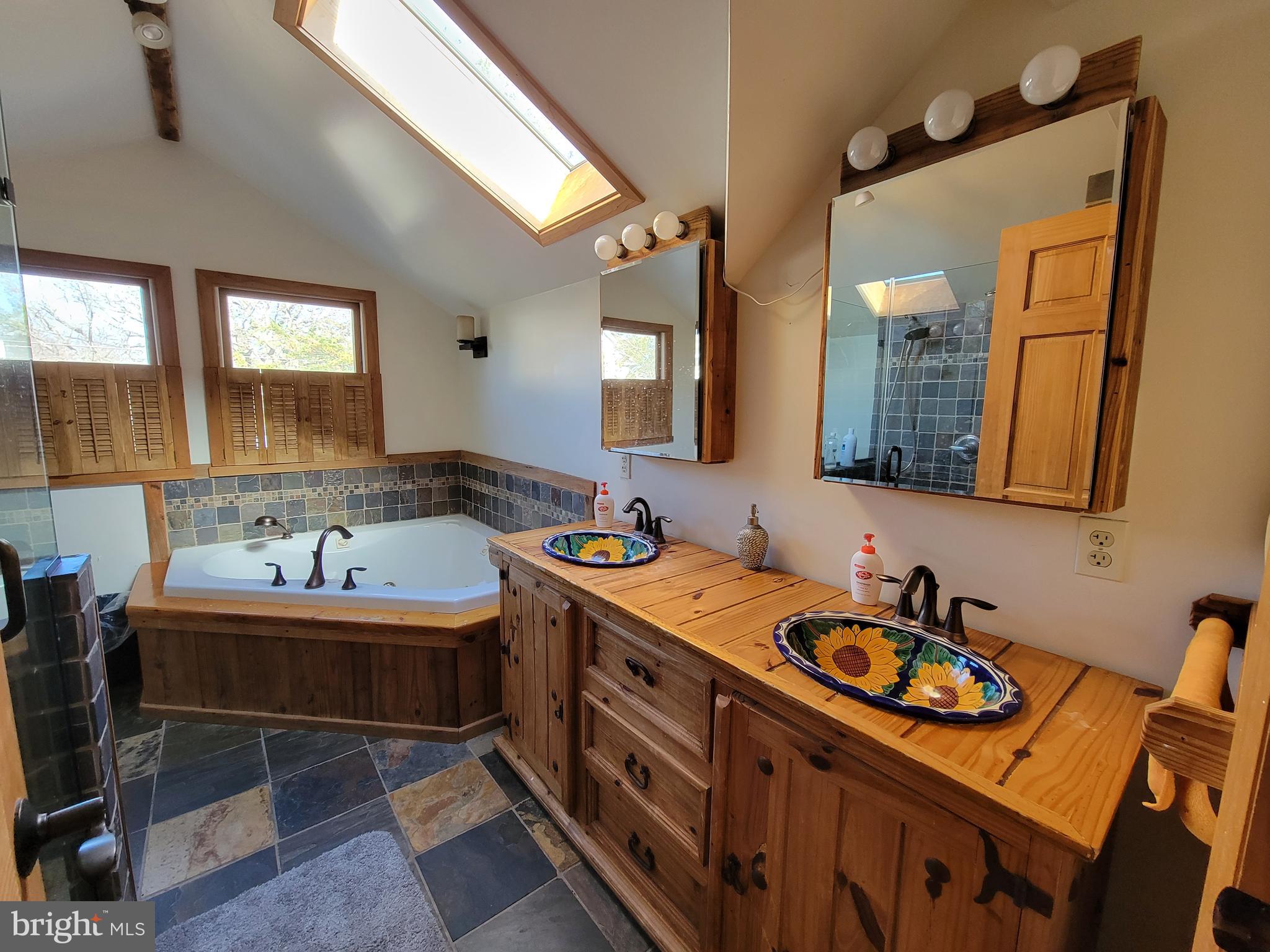 214 Villanova Road Glassboro, NJ 08028 - Photo 15 of 15 a bathroom with a sink double vanity and a mirror