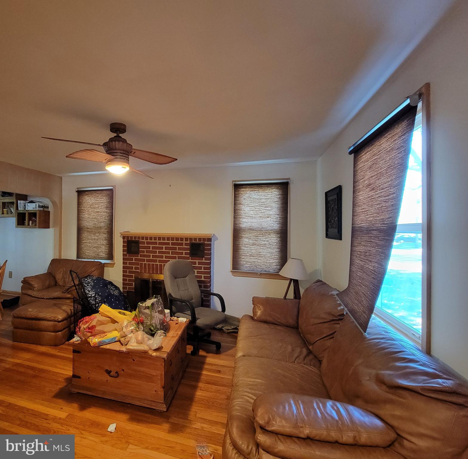 214 Villanova Road Glassboro, NJ 08028 - Photo 7 of 15 a living room with furniture and a large window