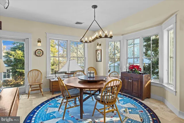 a view of balcony with furniture and wooden floor