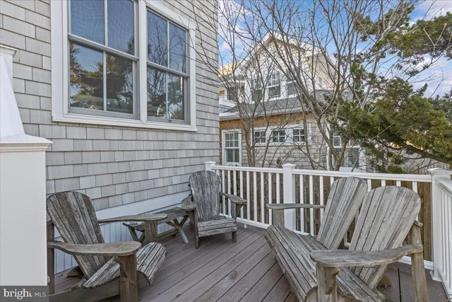 a view of entryway dining room and hall with wooden floor