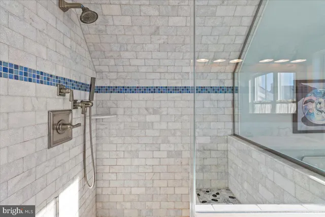 a bedroom with bed and window