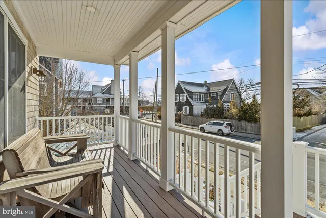 a view of a balcony with chairs