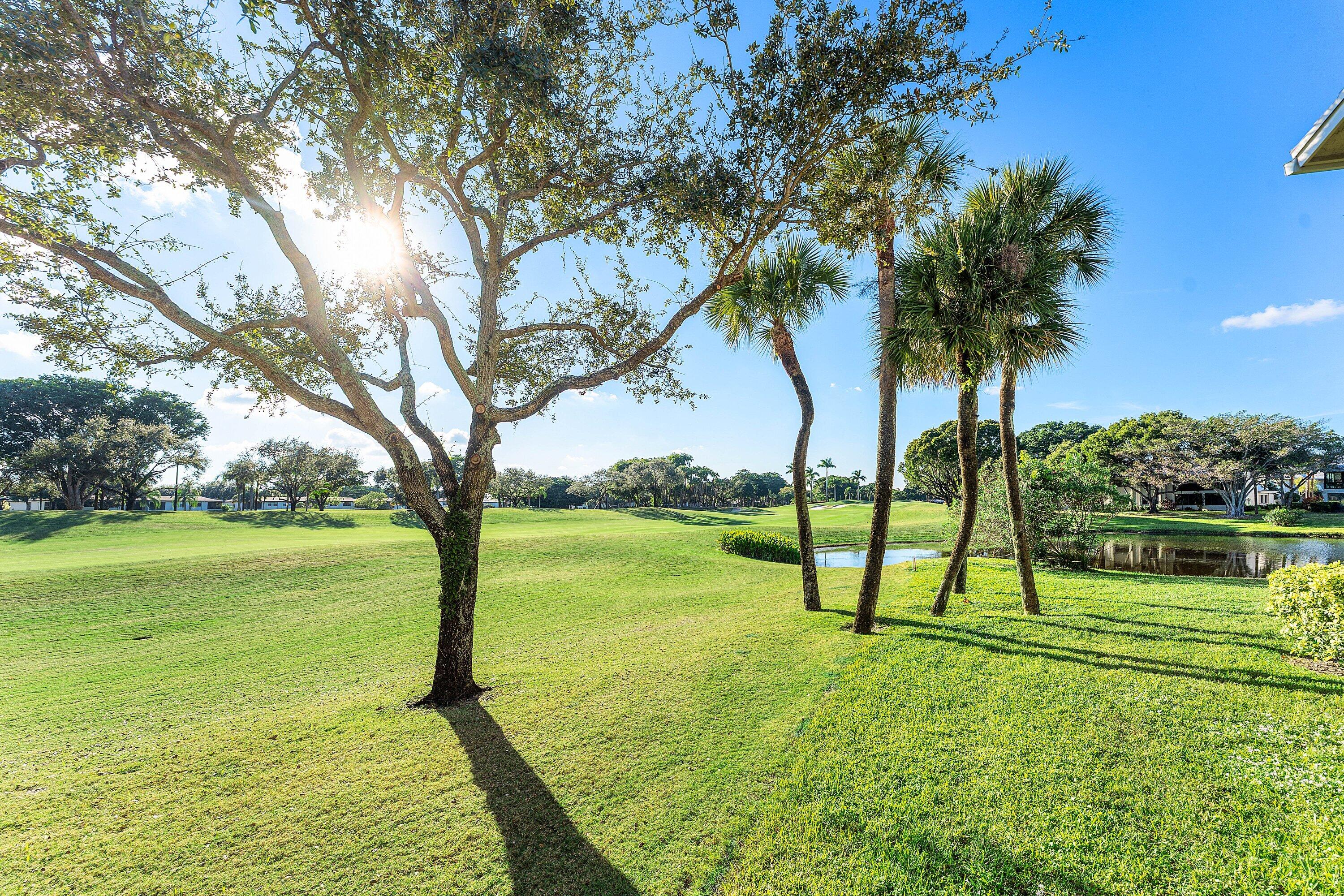 61 Eastgate Drive, Unit A Boynton Beach, FL 33436 - Photo 32 of 54 a view of an outdoor space and swimming pool