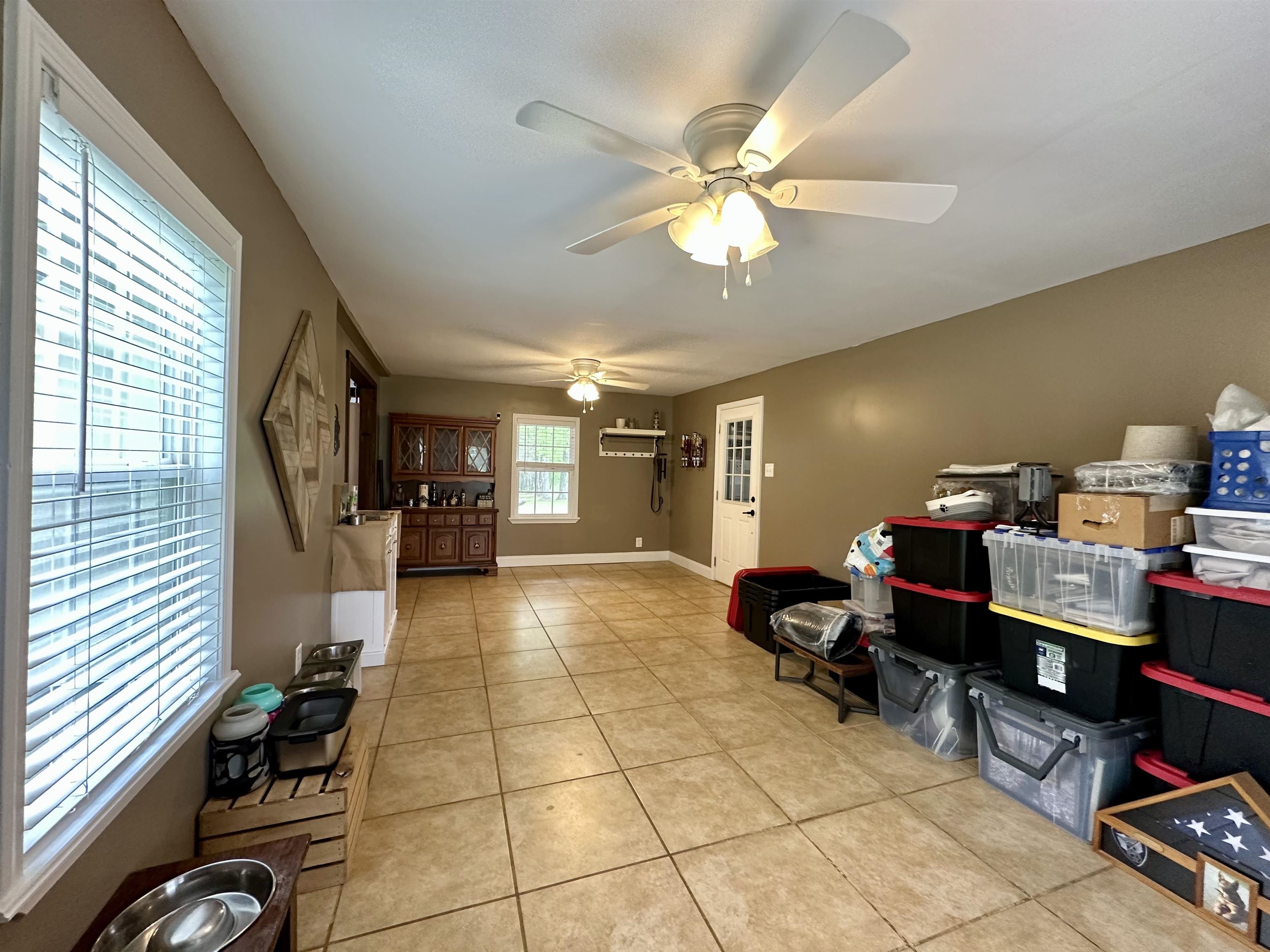 1230 Joann Road Somerville, TN 38068 - Photo 21 of 28 Interior space with light tile patterned flooring and ceiling fan