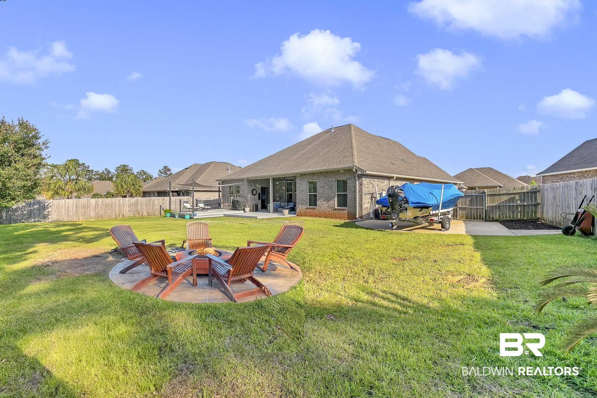 30635 Drayton Court Daphne, AL 36527 - Photo 42 of 51 View of yard with a patio and an outdoor fire pit