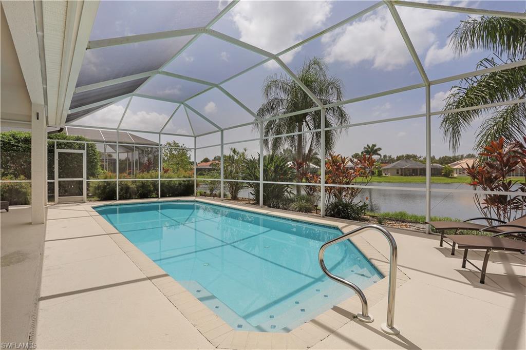 7699 Groves Road Naples, FL 34109 - Photo 29 of 30 a view of a backyard