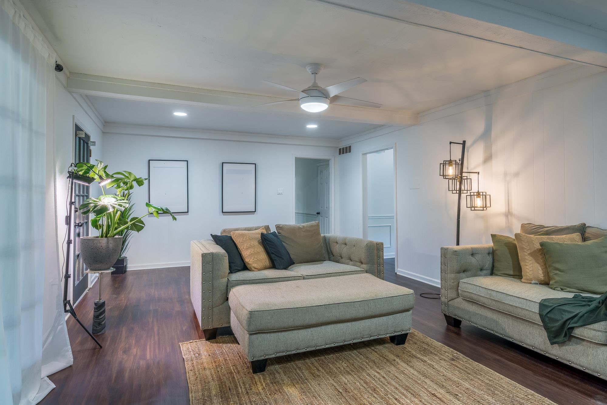 6780 Wytham Drive Memphis, TN 38119 - Photo 7 of 25 a living room with furniture and a potted plant