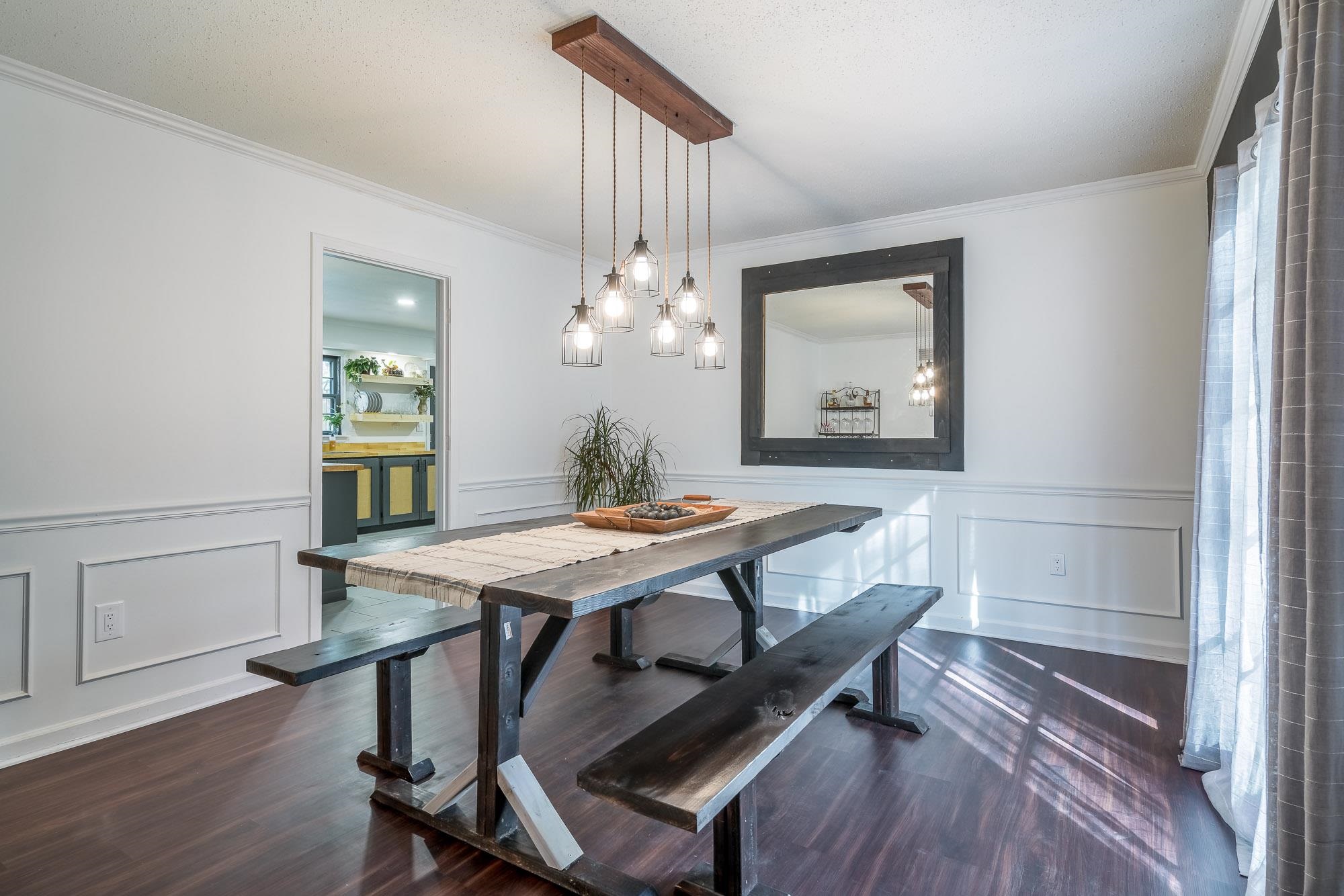 6780 Wytham Drive Memphis, TN 38119 - Photo 8 of 25 a view of a dining room with furniture and wooden floor