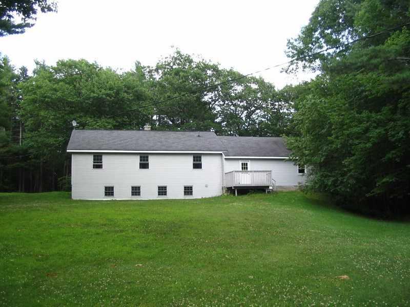 93 Fowler Road Orrington, ME 04474 - Photo 11 of 35 Yard/Garden. The yard slopes away...
