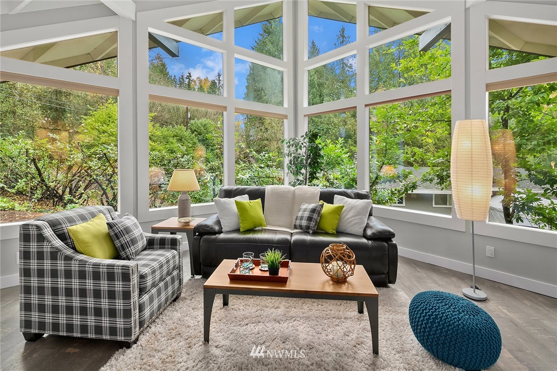 21105 West Richmond Road Bothell, WA 98021 - Photo 4 of 21 a living room with furniture and a large window