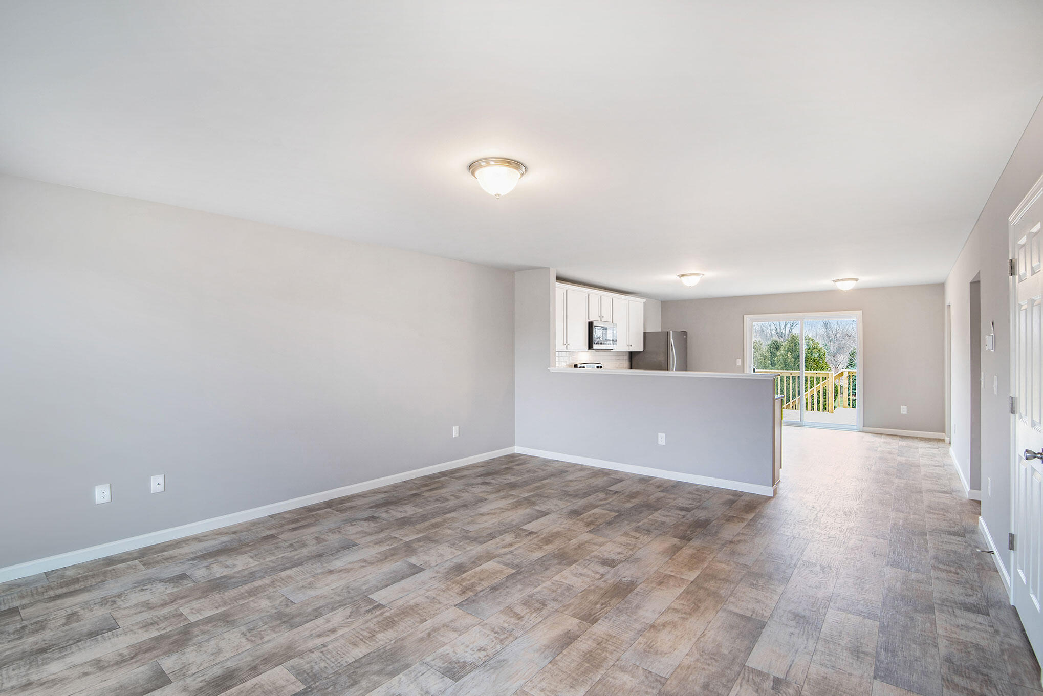 9377 Ellis Road Belding, MI 48809 - Photo 5 of 38 MWK080-i1830-Great Room2