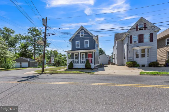 a view of a building with a street