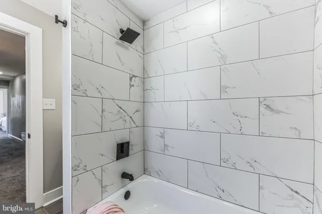 a bathroom with a bathtub