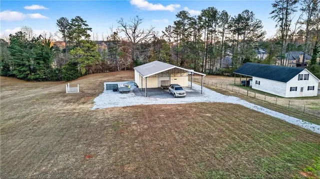 a view of a swimming pool with an outdoor space