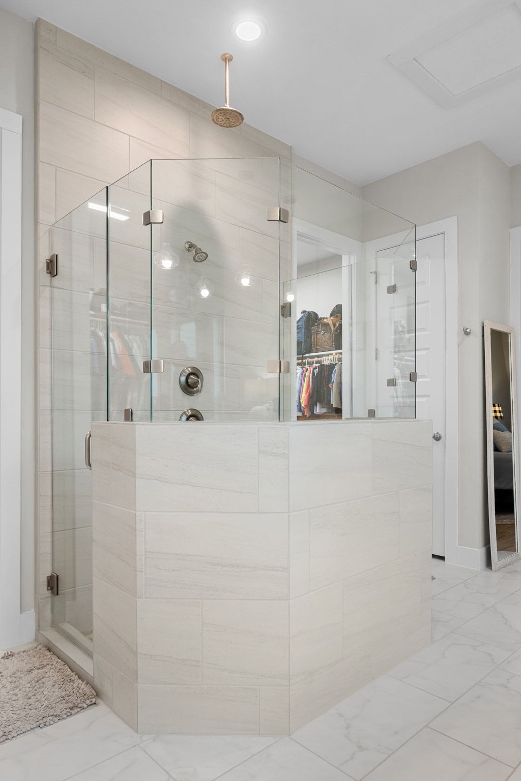 2009 Nature View Loop Driftwood, TX 78619 - Photo 15 of 40 a bathroom with a glass shower door